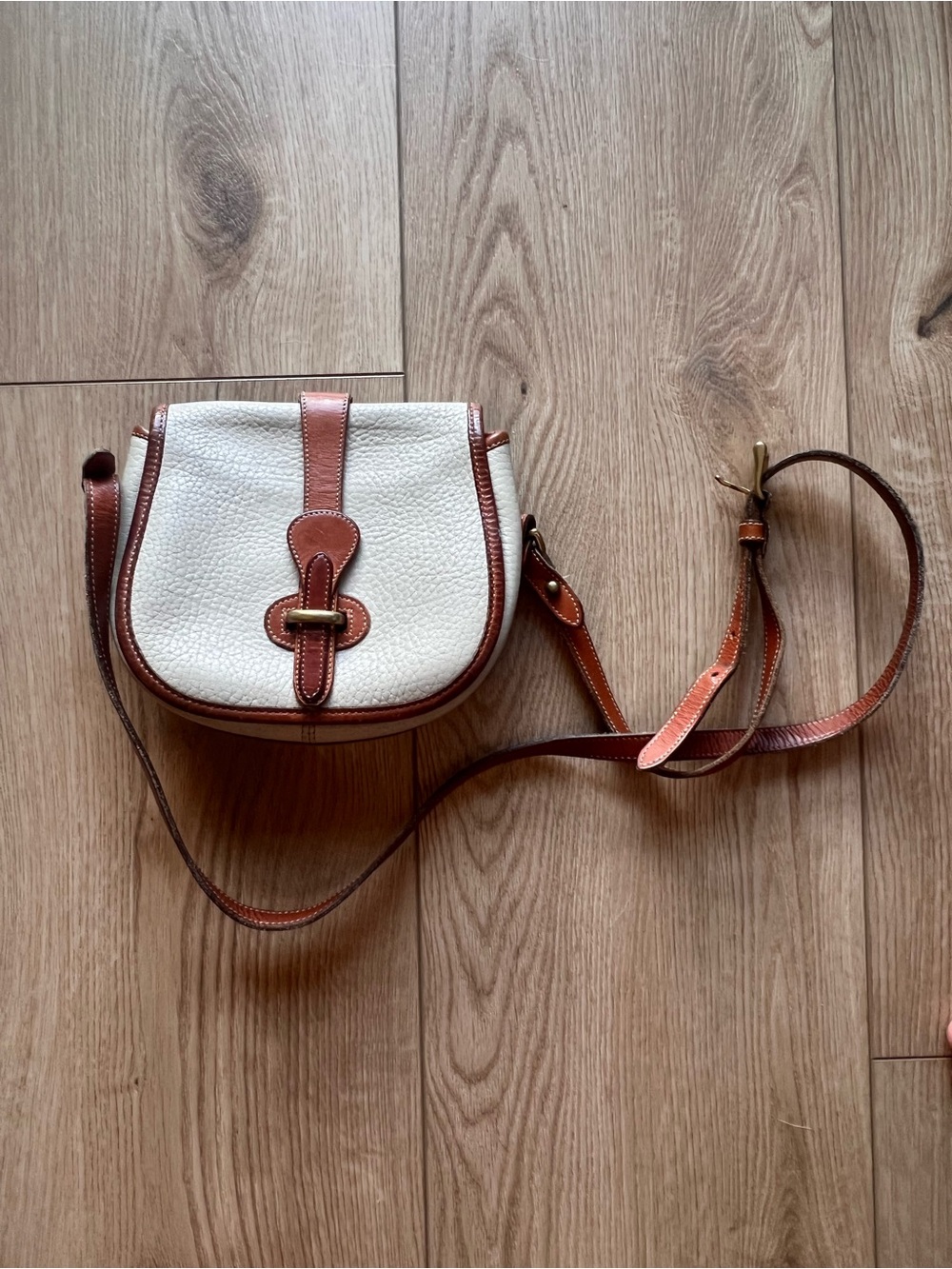 Dooney & Bourke Cream and Brown Leather Crossbody Saddle Bag